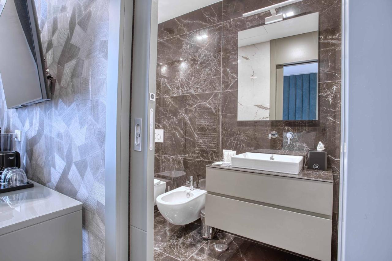 Le Suite Del Corso The Smart Boutique Aparthotel By Ospitami Milan Bagian luar foto